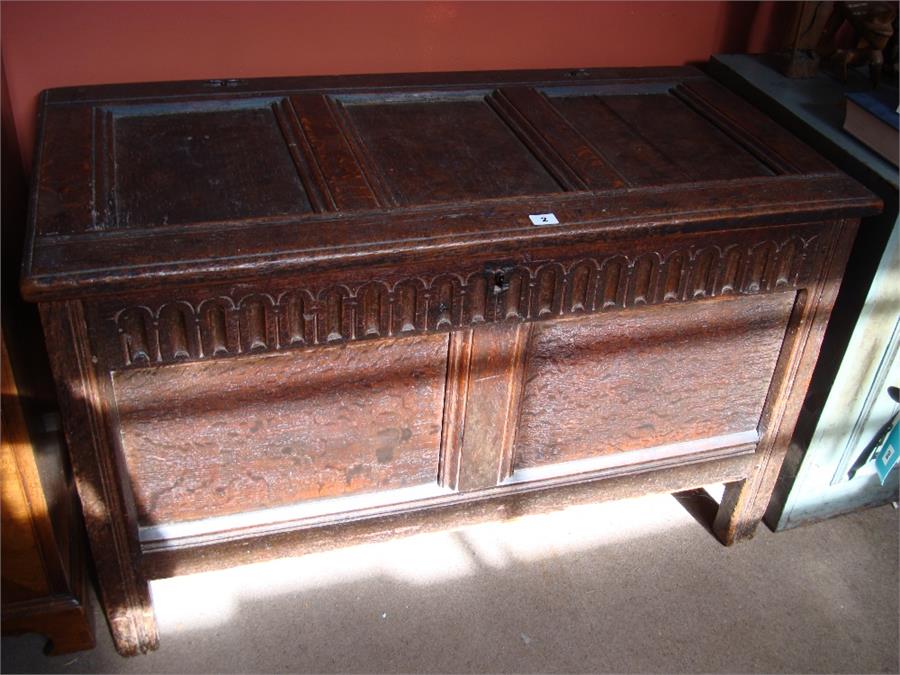 An early 18th Century oak three panel coffer. 106 x 53 x 66cm high.