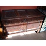 An early 18th Century oak three panel coffer. 106 x 53 x 66cm high.