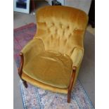 A Parker Knoll armchair, model no. PK 1022-27.  Buttonback, upholstered in yellow and green, 36cm