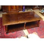 A low two section coffee table, on six legs, the lower section made from planks. 158 x 81 x 46.5cm.