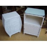 A Lloyd Loom white painted bedside cupboard together with a linen basket (2).