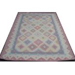 An Indian dhurrie rug, multicoloured geometric shapes on a cream background. 256 x 174 cm.