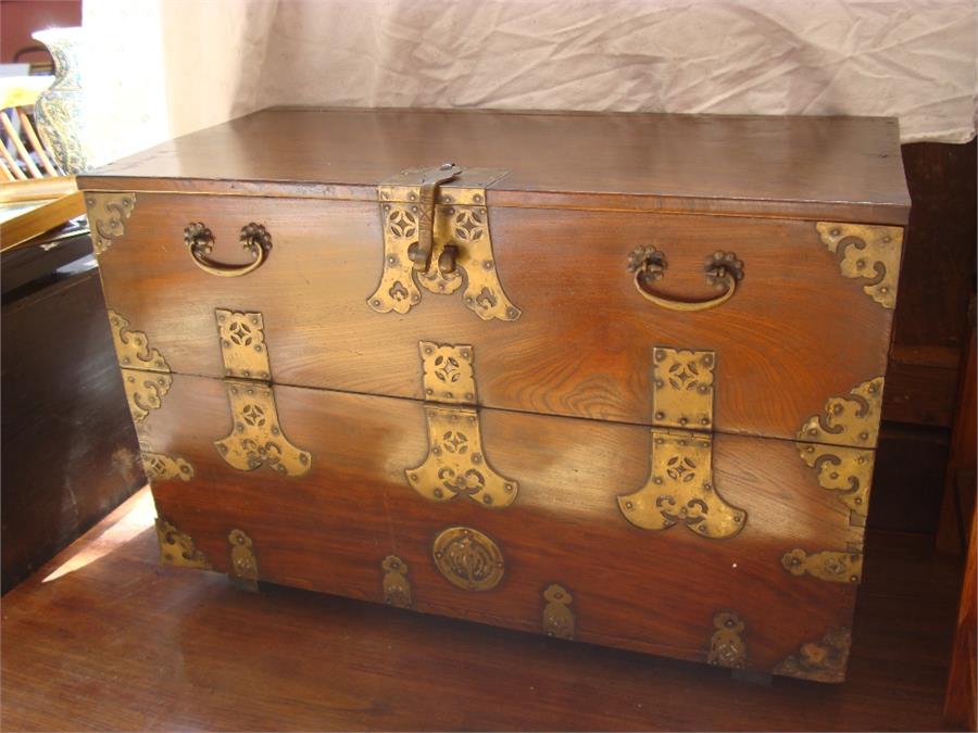 A Korean chest with lift down flat, brass mounts. 77.5 x 38.5 x 52cm high