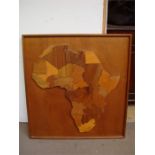 A wooden wall hanging of Africa. 72 x 76cm.