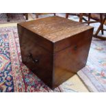 An early 19th Century travelling cellarette, of square form with hinged top enclosing fitted