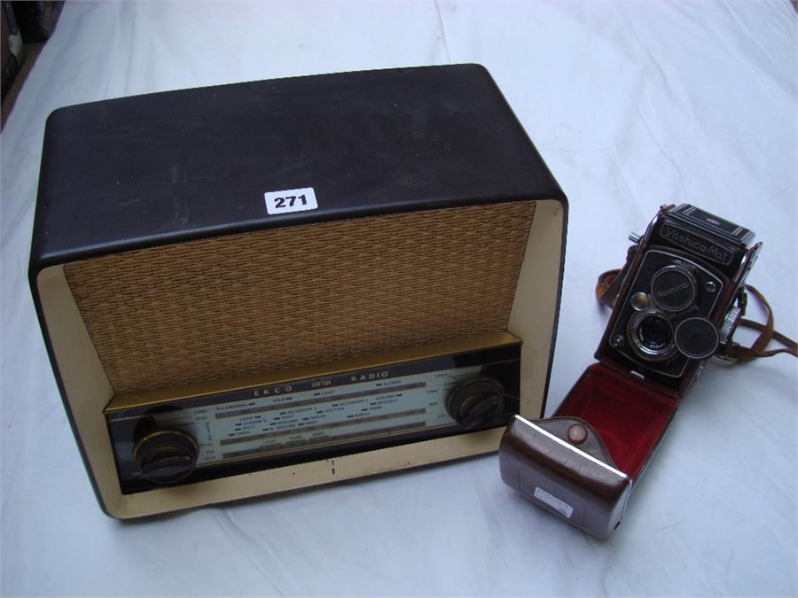 An Ekco VHF/AM radio, model U.319A together with a vintage Yashica-Mat camera (in case).