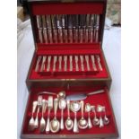 A mahogany cased canteen of cutlery.  Comprising Mappin & Webb stainless steel and silver plated