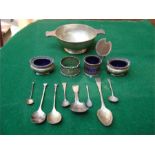 A collection of silver to include a pairof salts with blue glass liners, Birmingham, 1913 by E S