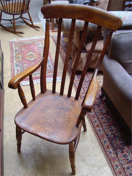 A high backed kitchen chair.