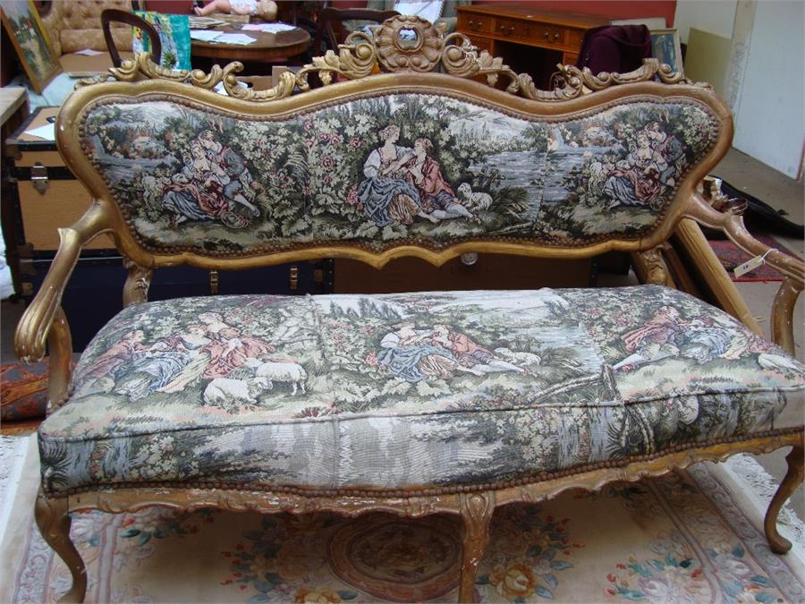 A Louis XV style giltwood framed three seater sofa. 161 x 63 x 113cm high (seat back height).