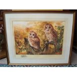 Spencer Roberts, a limited edition framed print of two tawney owls, signed in pencil together, a