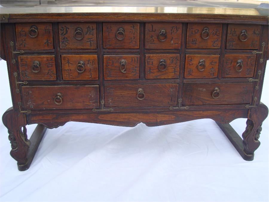 A Korean apothecary cabinet / alter coffer.  The rectangular top with rising ends above two rows - Image 2 of 3