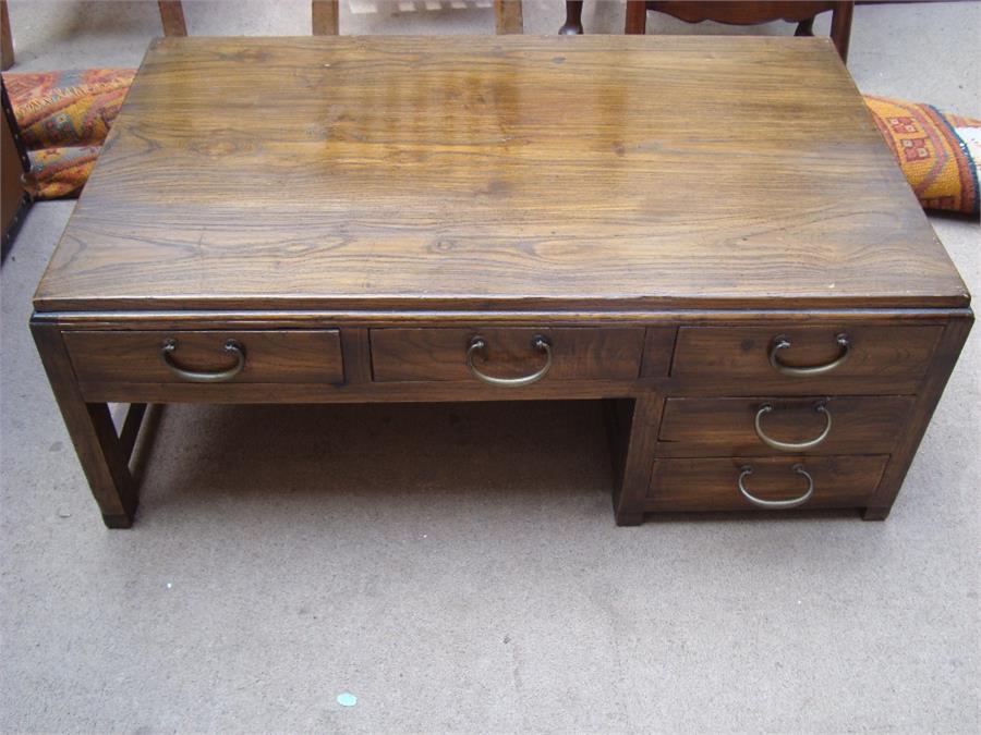 A Korean elm low side table, with five drawers. 85 x 50 x 33cm.