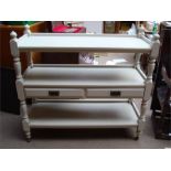 A painted Victorian mahogany three tier buffet, with two drawers to front.