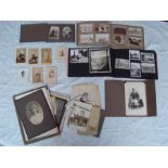 A collection of early 20th Century and later photograph albums and black and white portrait