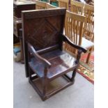 An old oak Monks chair, rectangular top with carve