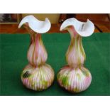 A pair of ribbed spatter glass frill topped vases in Bohemian style.