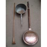 A mixed lot of copper comprising a warming pan, a saucepan and a post horn.