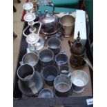 A mixed lot of pewter, silver plate and brass including jugs, candelabras etc.