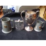 Golfing Interest.  A six ounce engraved pewter hipflask, an EPBM 1.5 pint engraved trophy by