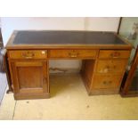 A Waring and Gillow twin pedestal desk.