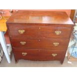 An early 19th Century chest of drawers.