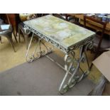 A marble topped garden table, on cast iron base.