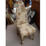 A Gothic style chair with embroidered latin verse