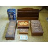 A selection of treen comprising four containers together with a tea tin and a wooden letter rack.