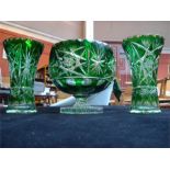 Three pieces of greeen and clear cut glass compris