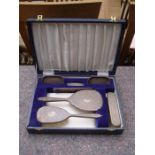 A cased Deakins and Francis Birmingham silver dressing table set (circa 1975), consisting of two