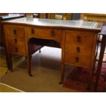 A reproduction bow fronted writing desk.