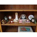 A mixed lot of small clocks comprising a 'New Zeal