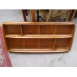 An Ercol open wall mounted display shelf unit. 107