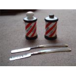 Two poss 1920's barbershop ceramic containers of red and white barber pole design together with