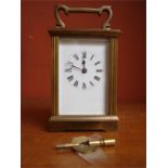 A 19th Century brass carriage clock, Swiss made  m