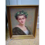 A 19th Century oil painting of a young lady, framed and signed.