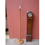 A standard lamp together with a clock (poss an app