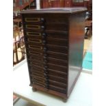 A mahogany cased twelve drawer music cabinet, each