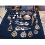 A small quantity of brass and silver plate including spoons, candlesticks, bells, horse brasses etc.