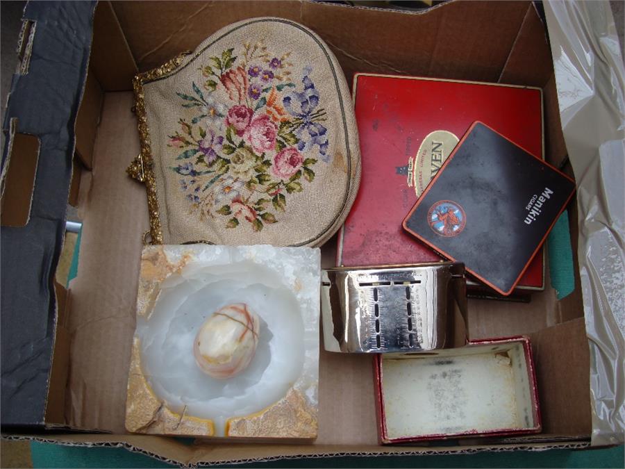 A mixed lot to include an embroidered ladies clutch bag, an onyx ashtray and egg, two cigarette /