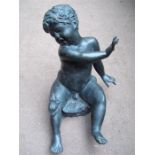 A bronze cherub with a frog on his knee, poss part of a water feature, with defined features, 38cm