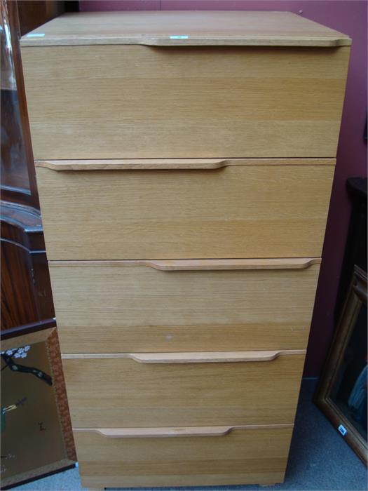 An oak five drawer tall chest, retailed by Habitat