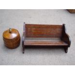 A wooden tobacco pot together with a wooden book slider.