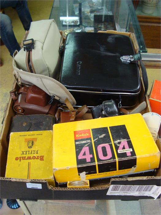 A selection of still, video and cine cameras to include a boxed Canon Super 8, a cased Canon