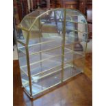 A boxed Franklin Mint brass and glass three tier curio cabinet.