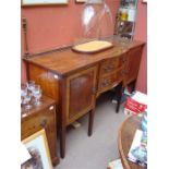 A reproduction sideboard.