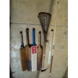 Sporting Interest.  Four cricket bats including a Peak Sports bat signed by the Kent team of 2004, a