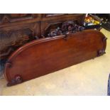 A Victorian mahogany double head board with applie