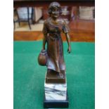 A bronze figurine of a young woman carrying a pot, on marble base, 13cm high.